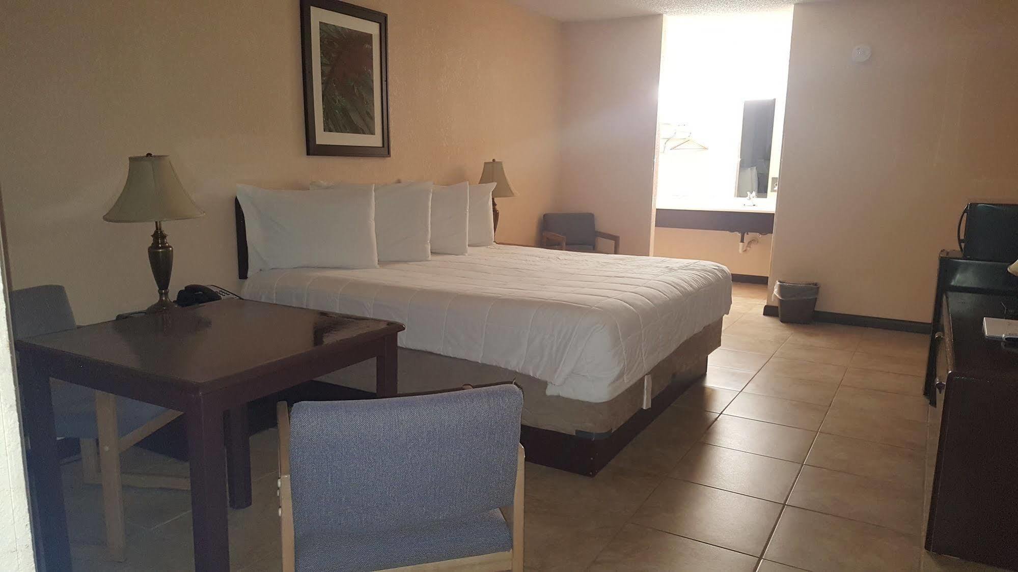 Palms Garden Inn Ellisville Extérieur photo